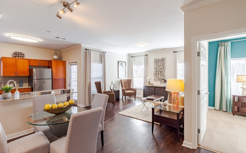 a living room with tables and chairs
